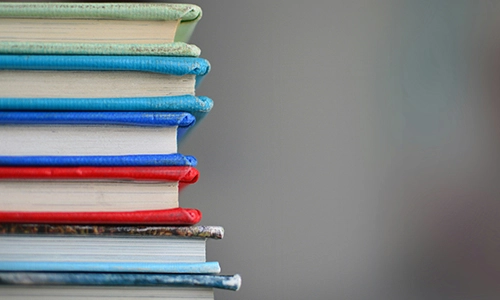 Stack of colourful notebooks