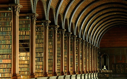 Rows of antique books in the Old library at Trinity College Dublin