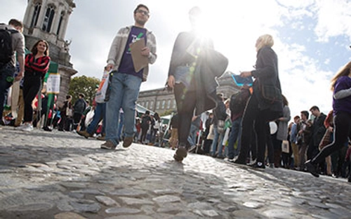 students walking across campus