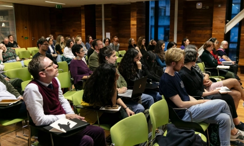 An audience seated in the Neill Lecture Theatre, Trinity Long Room Hub.